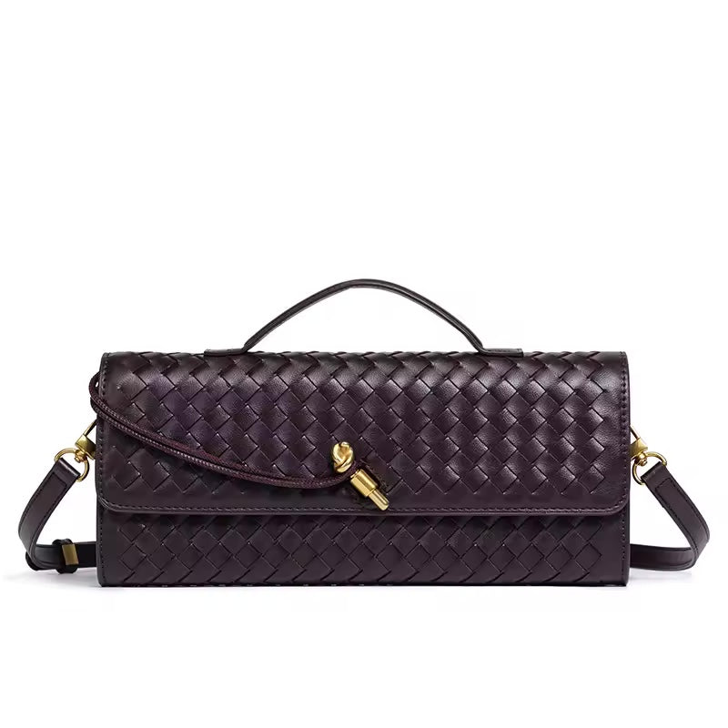 The Andie woven vegan leather shoulder clutch in espresso brown with gold knot toggle and detachable crossbody strap by Karvelle