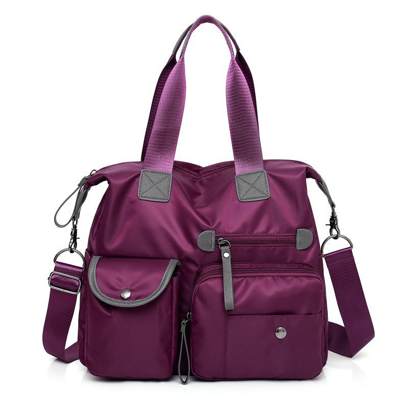 Large capacity waterproof nylon tote bag for women in Dark Purple
