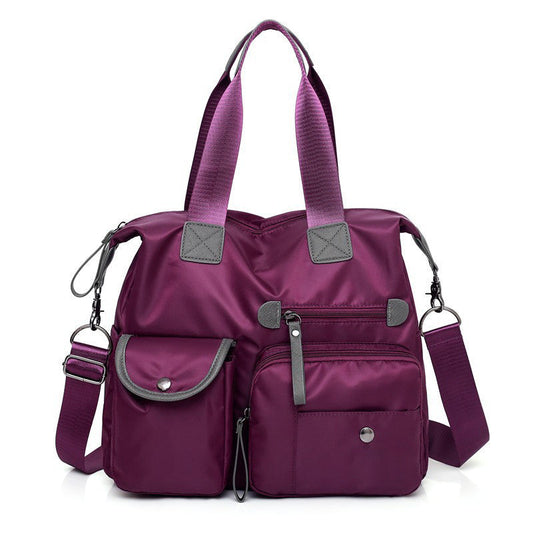 Large capacity waterproof nylon tote bag for women in Dark Purple
