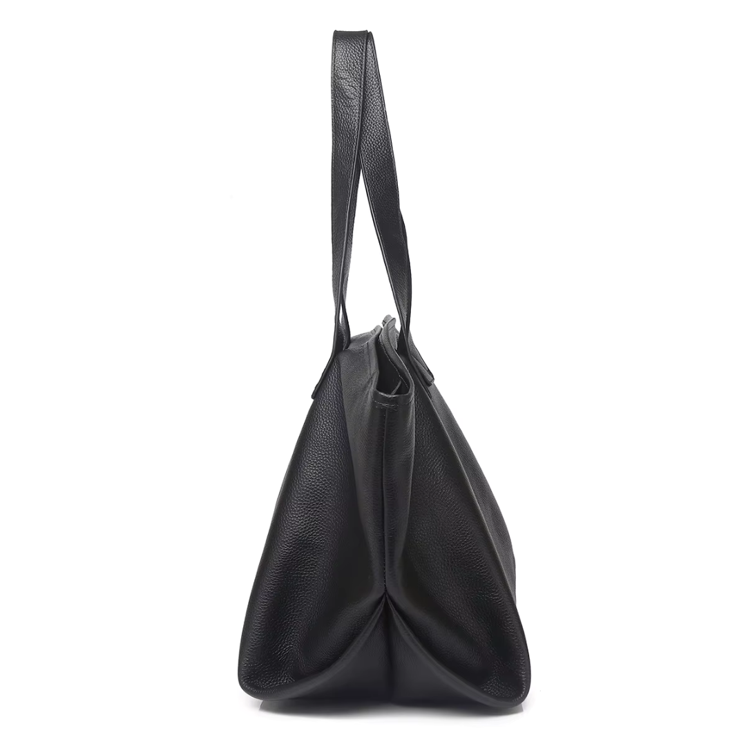 Black genuine leather mini tote side profile showing depth and shoulder straps