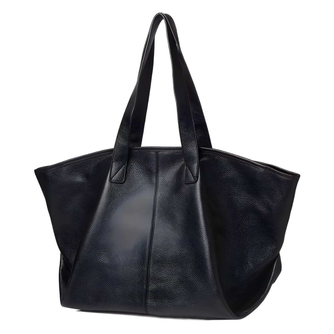 The Celeste genuine leather mini tote in black - front view showing structured silhouette and premium leather grain