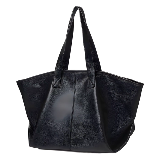The Celeste genuine leather mini tote in black - front view showing structured silhouette and premium leather grain
