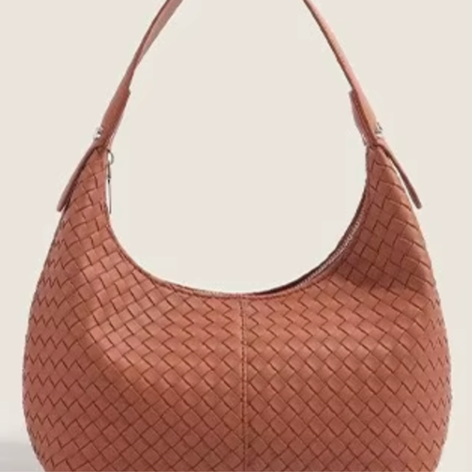 The Colette woven vegan leather mini tote in cognac - front view showing warm brown woven texture and shoulder strap